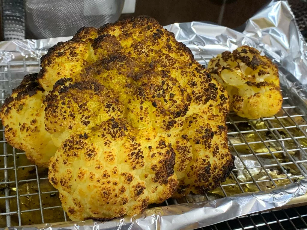 https://www.sizzleandsear.com/wp-content/uploads/2020/10/steamed-and-roasted-cauliflower-in-an-anova-precision-oven-1024x768.webp