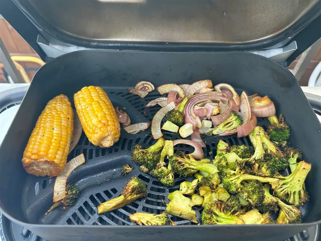 https://www.sizzleandsear.com/wp-content/uploads/2023/05/smoked-vegetables-on-the-Ninja-Woodfire-1024x768.webp